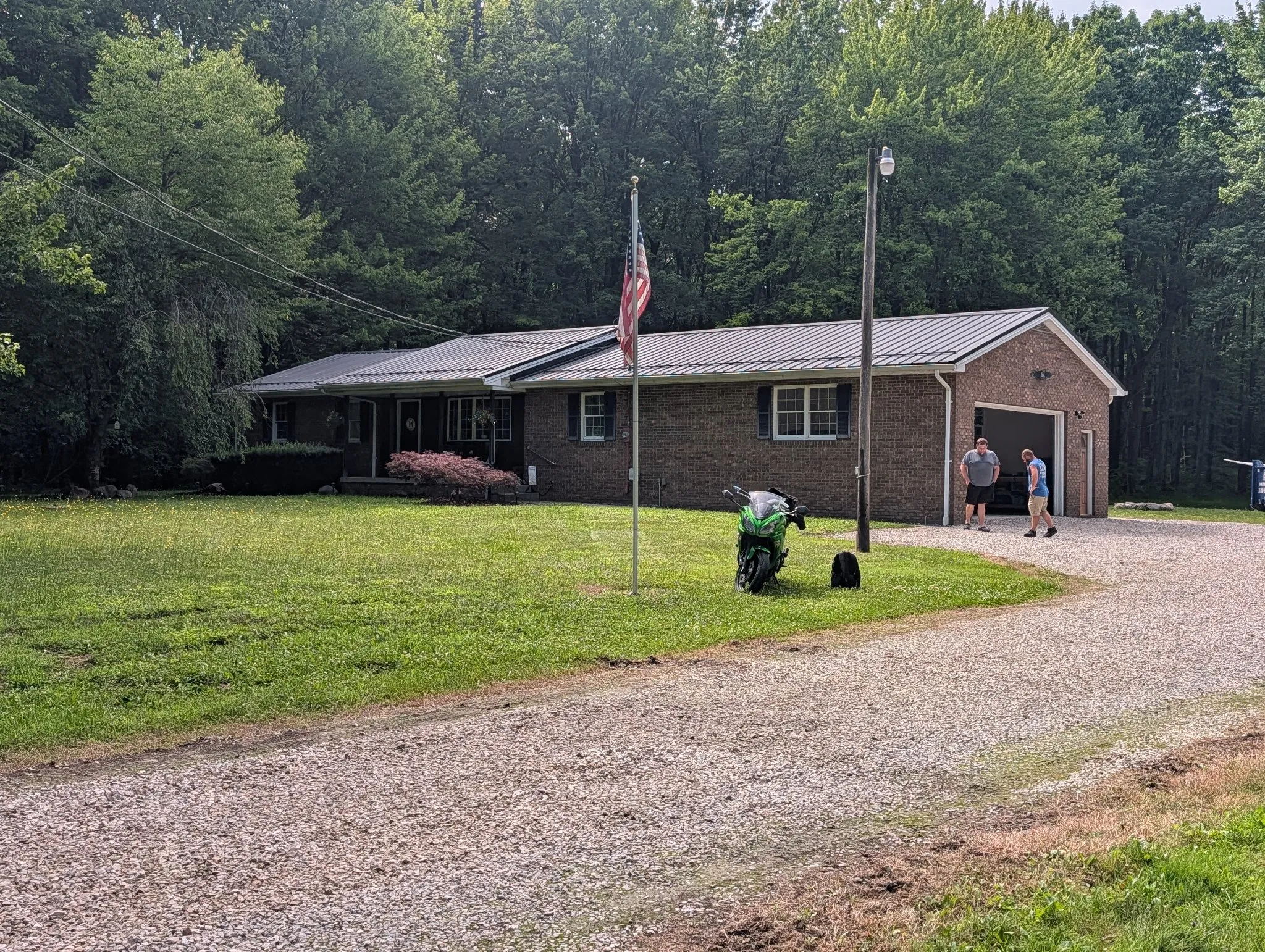 Front elevation of a Cortland home with a metal roof